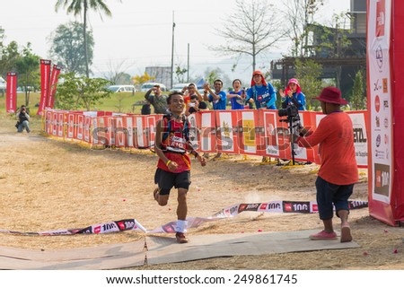 PAKCHONG, THAILAND - JANUARY 31 : K.Sayan 1st place winner of 100km trail running in The North Face 100 event on January 31, 2015 in Pakchong, Thailand.