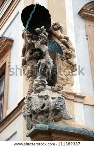 one of a number of characteristic signs-decorations that we can see on the houses of Prague citizens