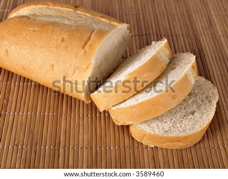 A loaf of French Bread on a place mat
