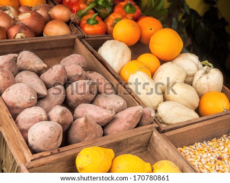 various organic fruits and vegetables in a market place