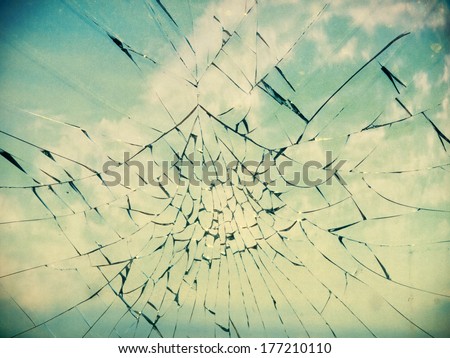 vintage retro styled broken glass window, filtered image