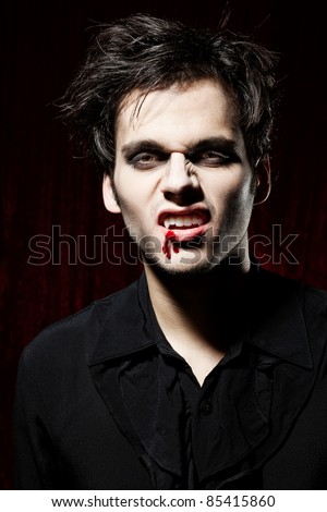 Male vampire showing his teeth