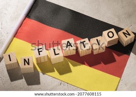 Germany flag and wooden cubes with text, concept on the theme of inflation in the country Foto stock © 