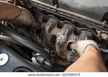Similar – Image, Stock Photo Mechanic putting on protective mask in workshop