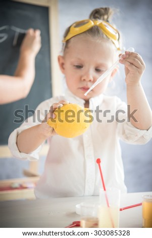 Girl in the laboratory of food quality tests