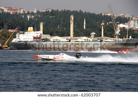 ISTANBUL - SEPTEMBER 25: An Off-Shore racing boat speeds along the water at the UIM World Offshore 225 Championship, September 25, 2010 on the Golden-Horn bay in Istanbul, Turkey. FRANKE team runs