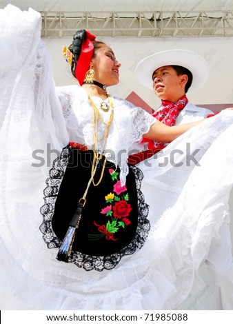 ISTANBUL - APRIL 23: Unidentified 12 years old Mexican children in traditional costume perform folk dance on \