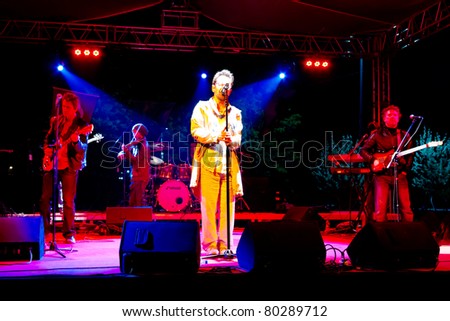 ISTANBUL - MAY 19 : Singer Feridun Duzagac performs live during a concert for national youth festival at Maltepe open air stage on May 19, 2011 in Istanbul, Turkey.