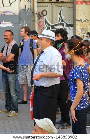 ISTANBUL - JUN 17: Five labor unions call 1-day nationwide strike over crackdown on June 17, 2013 in Istanbul. Trade union members shout slogans as they gather to protest against police brutality.