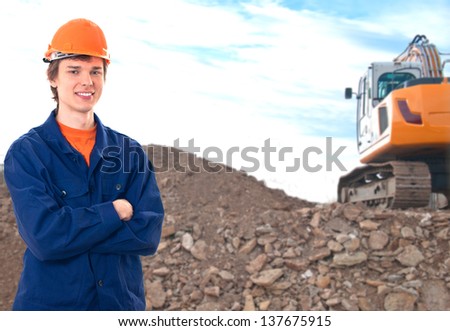 smiling construction worker on the background