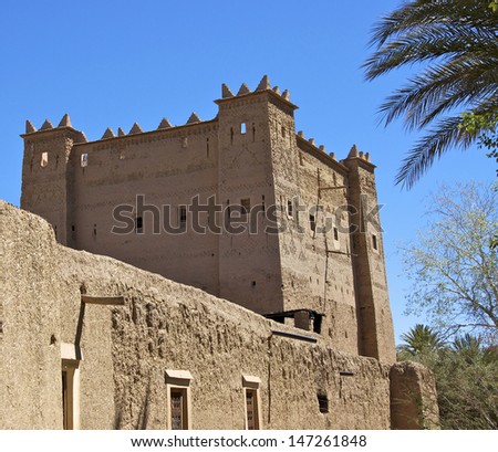 SKOURA, OUARZAZATE, MOROCCO - MARCH 18: Kasbah Ait Abou, Skoura Palmerie is a typical Kasbah or fort for the area on March 18, 2011in Skoura, Morocco.  The fort is now a hotel.