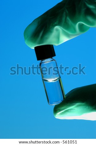 Hand Holding Sample Vial