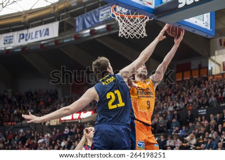 VALENCIA, SPAIN - MARCH 5: Sam Van Brossom  And Tibor Pleis during EURO CUP match between Valencia Basket Club and Bascelona F.C. Basket at Fonteta Stadium on March 22, 2015 in Valencia, Spain
