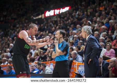 VALENCIA, SPAIN - MARCH 5: Bayrn Munic player and trainer during EURO CUP match between Valencia Basket Club and Bayern Munich at Fonteta Stadium on March 5, 2015 in Valencia, Spain
