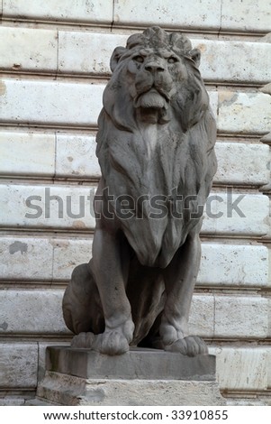 Isolated stone lion from The Chain Bridge in Budapest, Hungary.