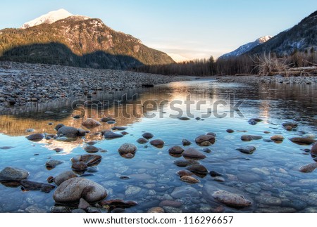 Similar – Image, Stock Photo beautiful clear mountain river Ara in long exposure with mountain in golden sunlight in background, Pyrenees, Spain