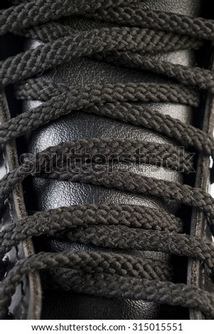 Black Leather Army Boots on white background