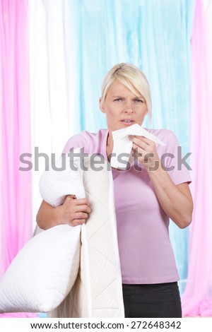 Woman with handkerchief and cushion and mattress