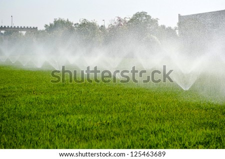 An irrigation pivot watering a field  in  Dubai /irrigation system /irrigation system