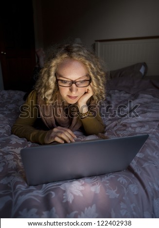 girl surfing internet at night