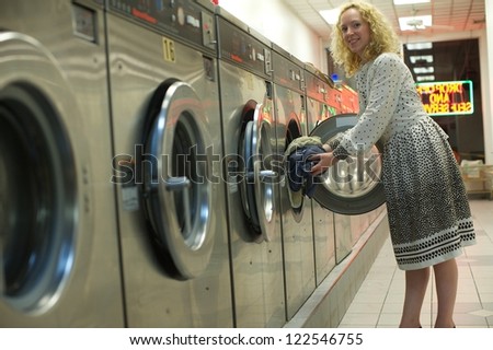 laundromat girl washing clothes