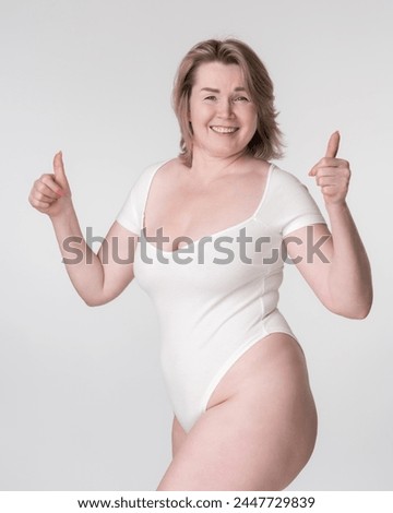 Similar – Image, Stock Photo Curvy woman in bodysuit lying on bed