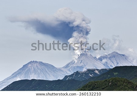Beautiful volcanic (mountain) landscape of Kamchatka: eruption active Zhupanovsky Volcano on Kamchatka Peninsula (Russia, Far East).