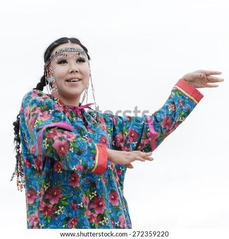 KAMCHATKA, RUSSIA - AUGUST 9, 2014: Expression woman dance. Public concert Koryak Folk Dance Ensemble Angt on the Khalaktyrsky Beach around Petropavlovsk-Kamchatsky City.