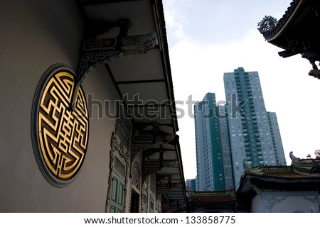 Gold China Letter. Symbolic in China Temple. Contrast between new building and old style in Bangkok.