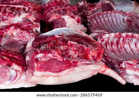 Fresh raw meat of pig in food market.