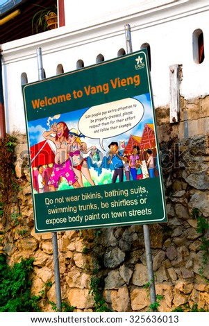 VANG VIENG, LAOS- 18 APRIL 2015 : Information board for tourist  at end point rafting, Song River, Vang Vieng, Laos.