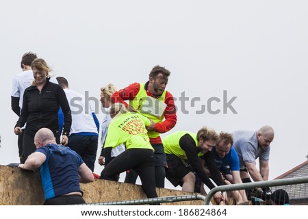 WHITLEY BAY, NORTH TYNESIDE- APRIL 5, 2014. Warriors Beach Assault, Charity Fun Run. Whitley Bay Beach front on April 5, 2014 Whitley Bay, North Tyneside, England, UK