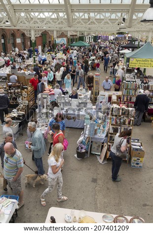 TYNEMOUTH, ENGLAND, JULY 20, 2014. Scenes of the famous Tynemouth Market. Stall holders and shoppers use Sunday morning market. Sunday July 20, 2014, Tynemouth, England, Uk.