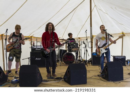 NORTHUMBERLAND, ENGLAND, AUGUST 30, 2014, Rock Band, Snake Head, perform at fund raising event in aid of Great North Air Ambulance. August 30, 2014. Northumberland, England, UK.