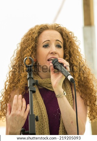 NORTHUMBERLAND, ENGLAND, AUGUST 30, 2014. Female singer, Rudi, performs at fund raising event in aid of Great North Air Ambulance. August 30, 2014, Northumberland, England, UK.
