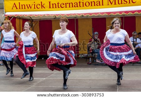 ALNWICK, NORTHUMBERLAND,UK. AUGUST 01, 2015. Apple Chill Cloggers USA, perfrom for public, Alnwick International Music Festival. August 01, 2015, Alnwick, Northumberland, England, UK.