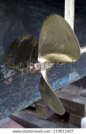 Brass Boat Propeller/ a boat\'s brass propeller cleaned and prepared for painting