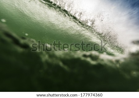 Wave Breaking/ a stormy wave creating and breaking