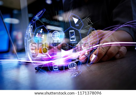 Digital marketing media (website ad, email, social network, SEO, video, mobile app) in virtual globe shape diagram.Waves of blue light and businessman using on smartphone as concept Foto stock © 