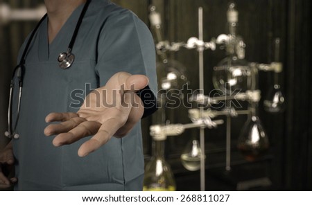 Traditional doctor working with blurred vintage bottle with bokeh background as vintage old school concept
