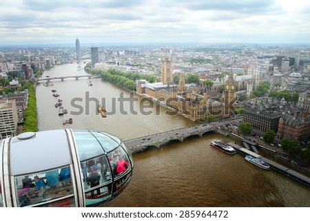 LONDON - MAY 22: View at Detail of London Eye\'s cabins from London Eye on May 22, 2015 in London. With height of 135 meters, it is the highest ferris wheel in Europe.