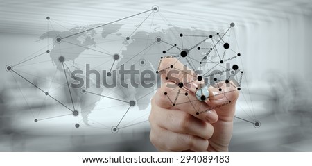 close up of hand working with new modern computer show social network structure