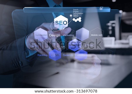 double exposure of businessman hand showing search engine optimization SEO as concept
