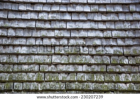Old traditional wooden tiled roof.