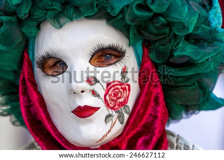SCHWAEBISCH-HALL, GERMANY - February 23, 2014 - Person, dressed up in a Venetian style costume attends the Hallia Venetia Carnival festival on February 23, 2014 in Schwabisch-Hall.