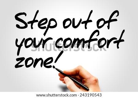 Hand writing Step out of your comfort zone!, business concept