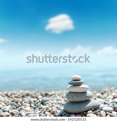 heap of stones like zen near sea. soft focus