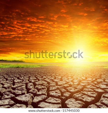 cracked earth and red sunset