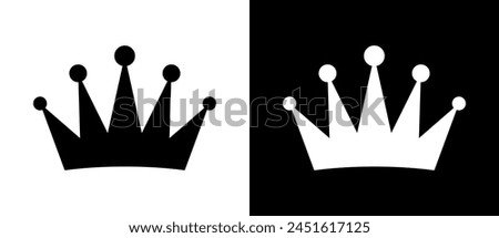 Simple crown as an icon or logo. Black shape on a white background and the same white shape on the black side.