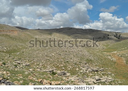 Nemrut Dagi. Mountains on the background of sky. Vertices covered with snow. Tourism and travel.